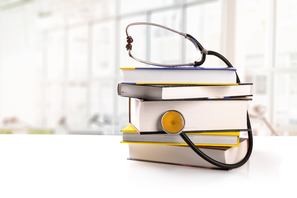 Medical,Education,-,Stack,Of,Books,With,Stethoscope,On,The